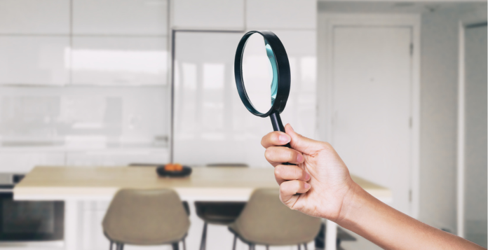 magnifying glass held in the kitchen